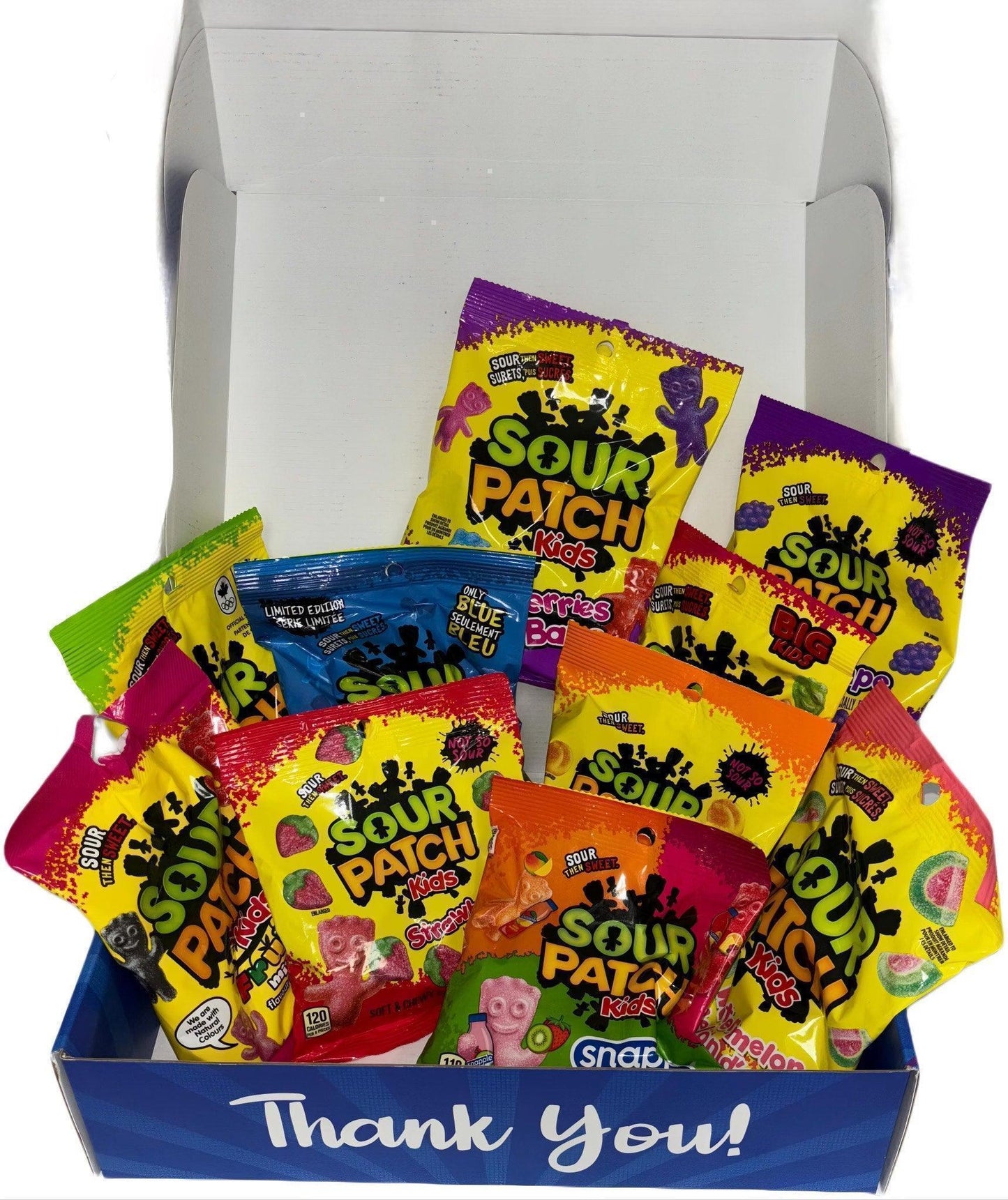 Box of colorful Sour Patch Kids candy bags, assorted imported sour and sweet snacks.