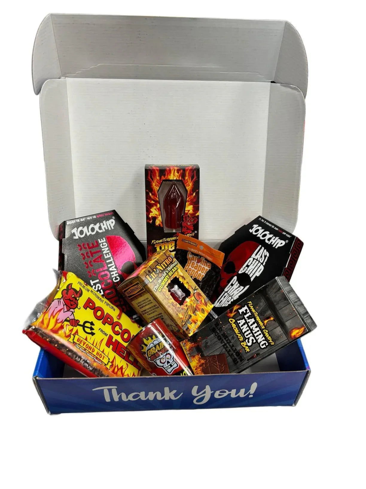 Box of extreme spicy snacks and exotic challenge chips assortment.