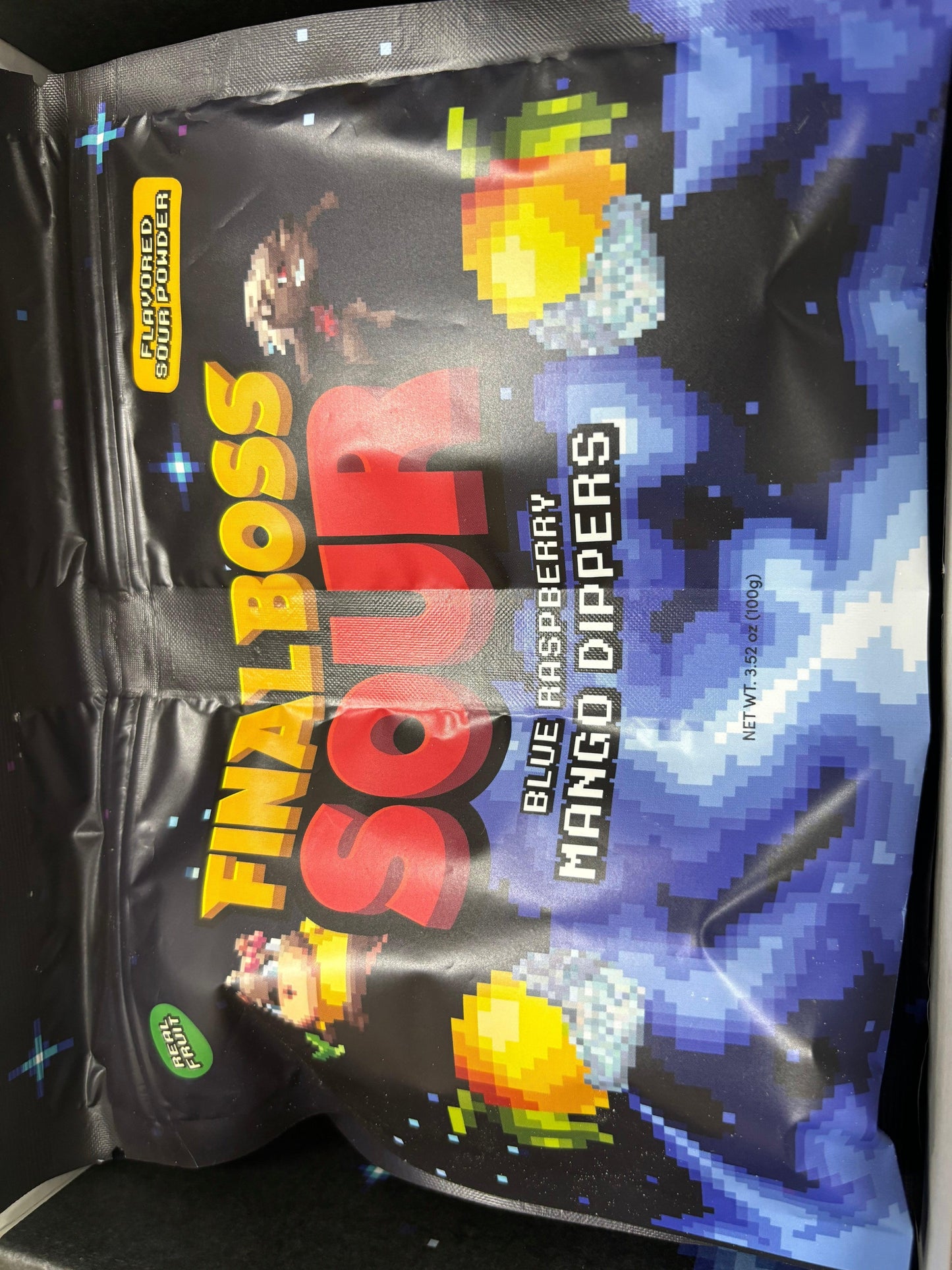 Final Boss Sour Blue Raspberry Mango Dippers candy bag with pixel art design