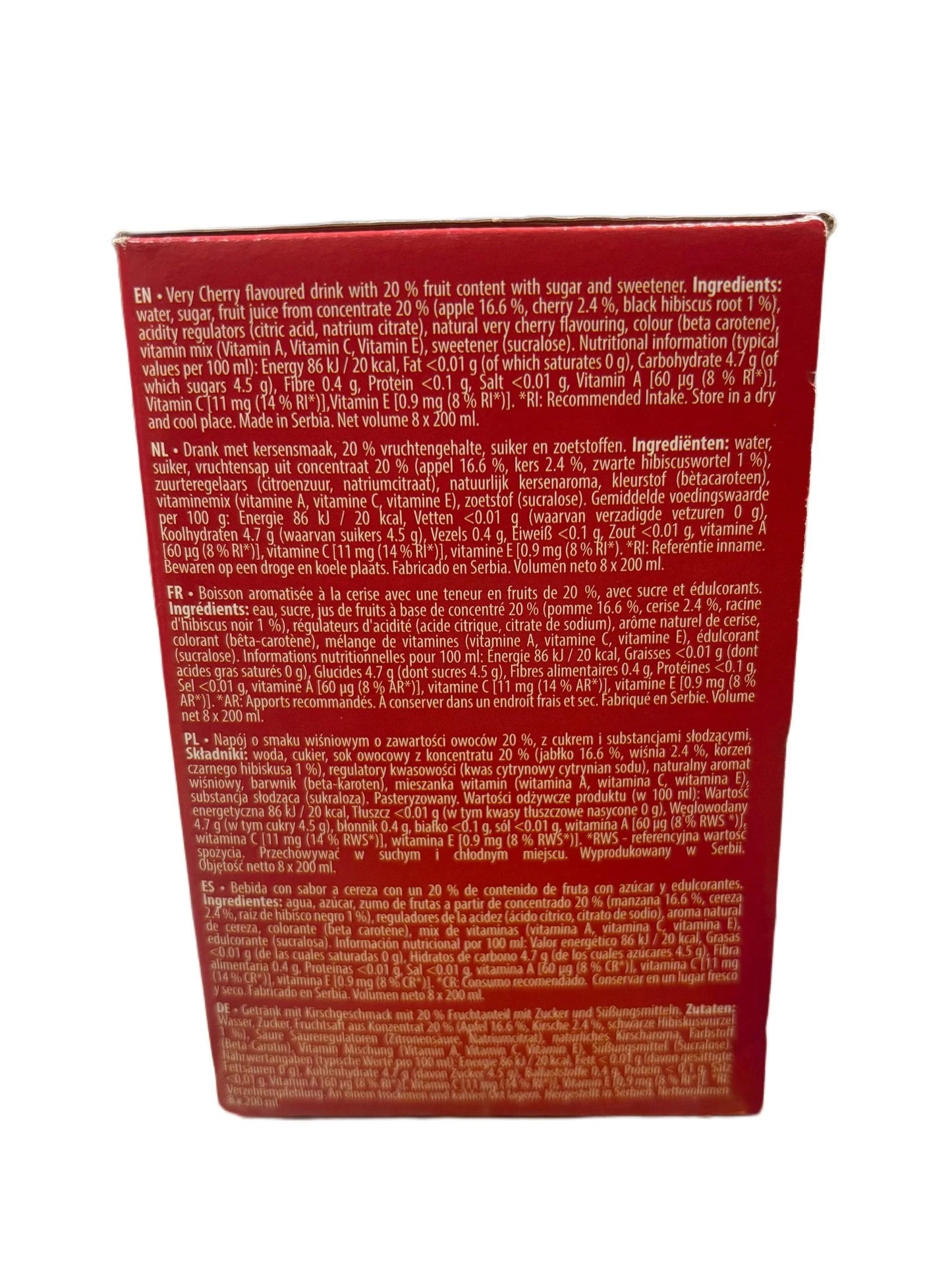 Back of cherry-flavored drink box showing ingredients and nutrition facts in multiple languages