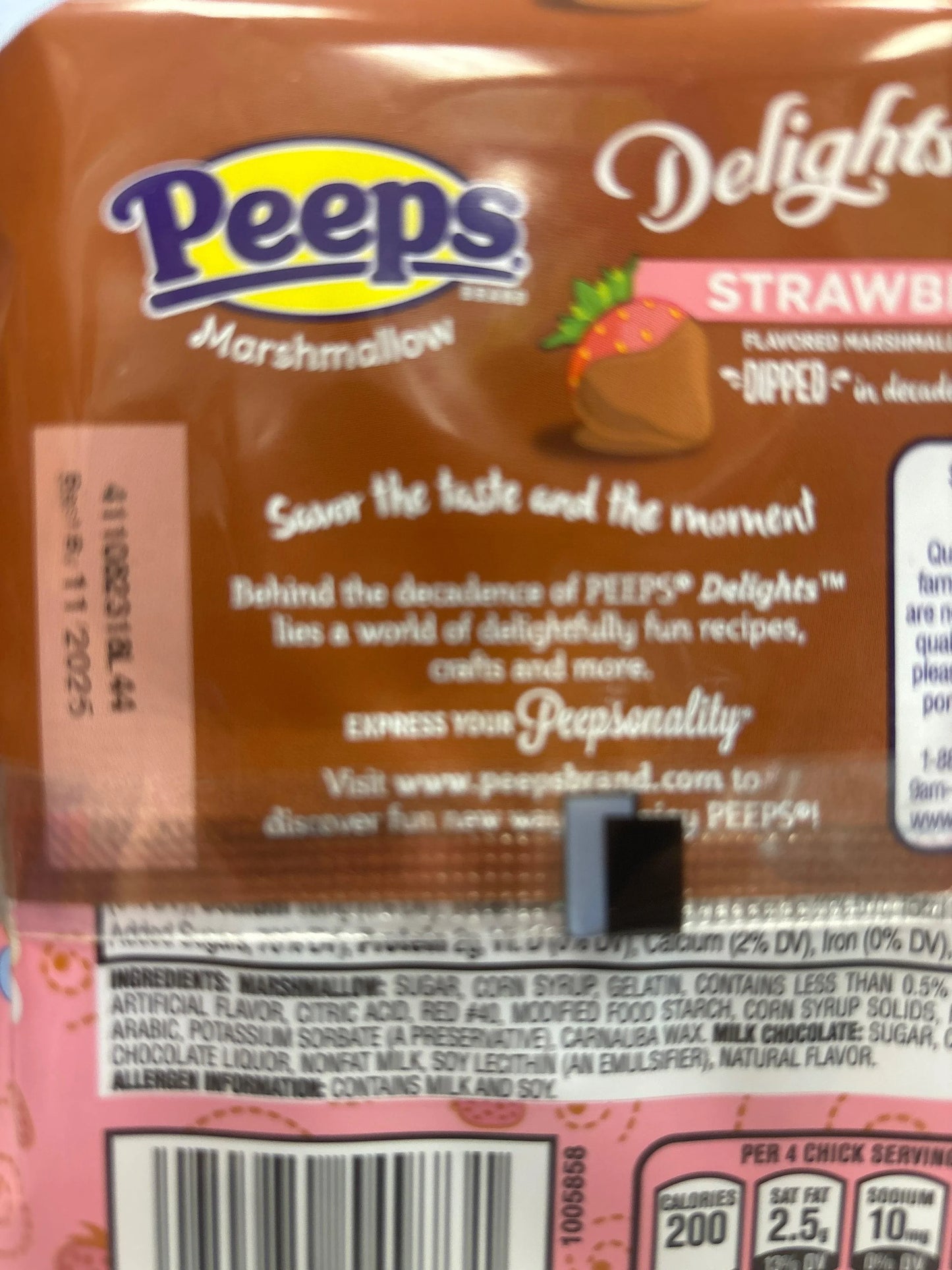 Peeps Delights strawberry flavored marshmallow candy dipped in chocolate with ingredients label.