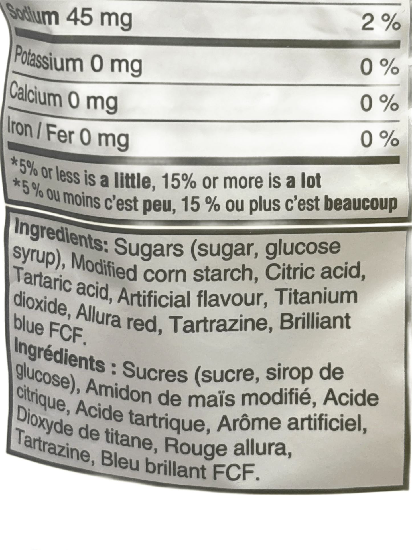 Snack nutrition label showing ingredients and nutrients in English and French on snack packaging