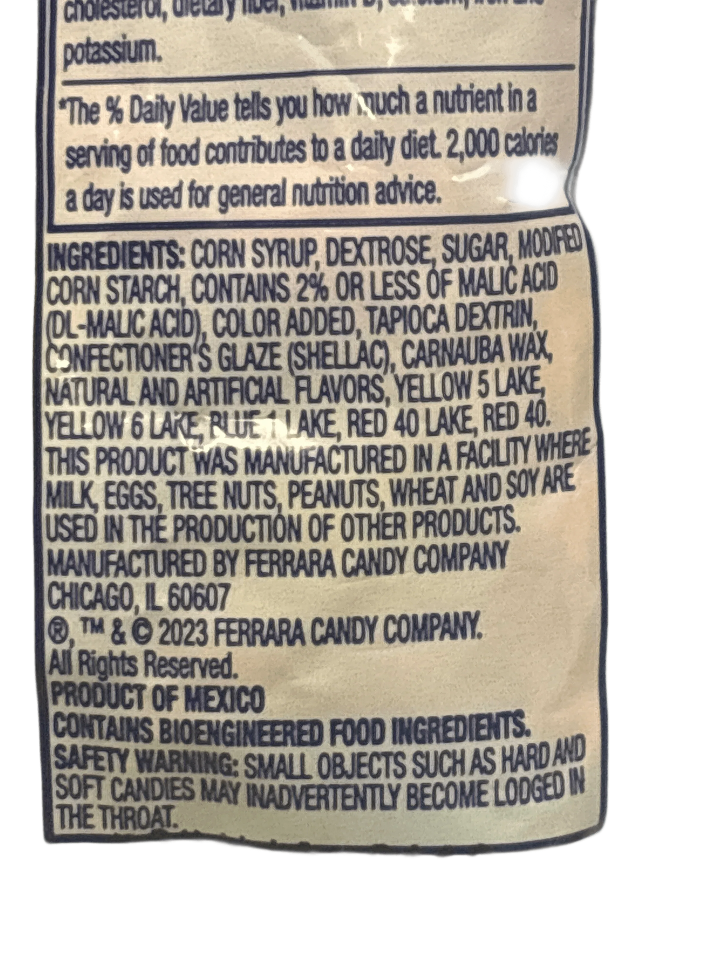 Close-up of exotic candy ingredients and allergy safety label, imported snack from Mexico.