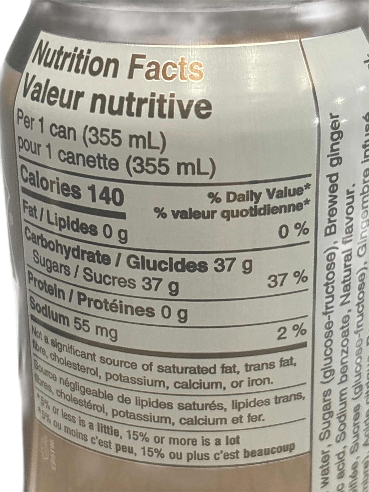 Close-up of nutrition facts label on an exotic imported canned drink, 355 mL, 140 calories.