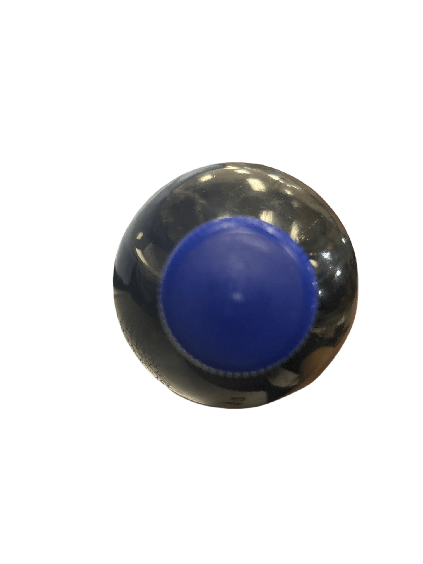 Top view of exotic soda bottle with blue cap, imported drink product