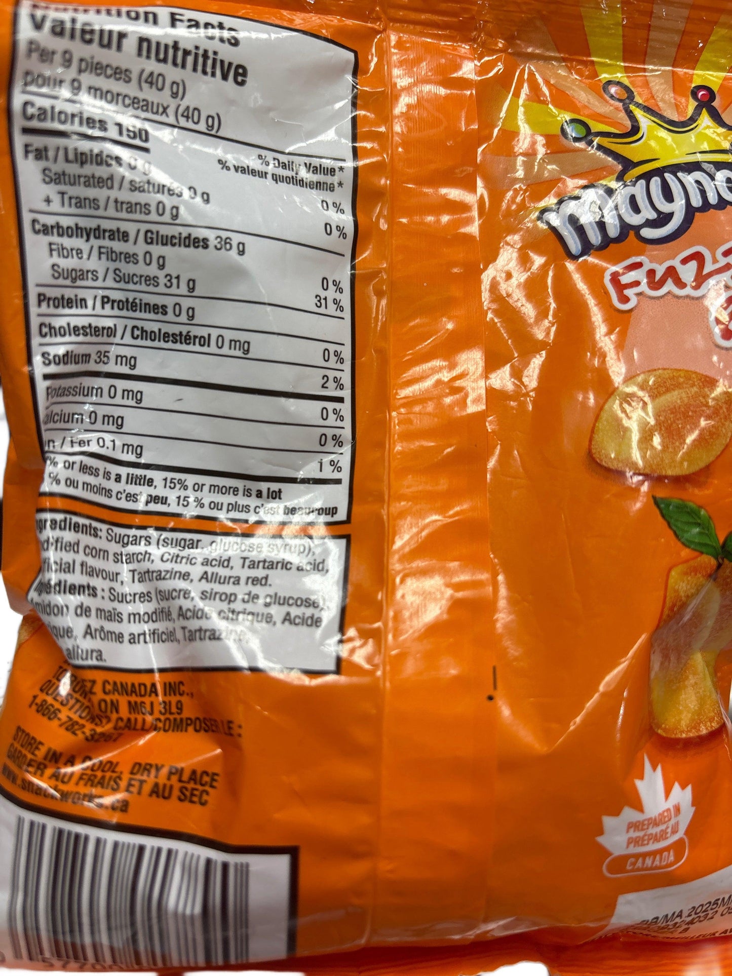 Maynards Fuzzy Peach candy bag showing nutrition facts, orange packaging, imported snack