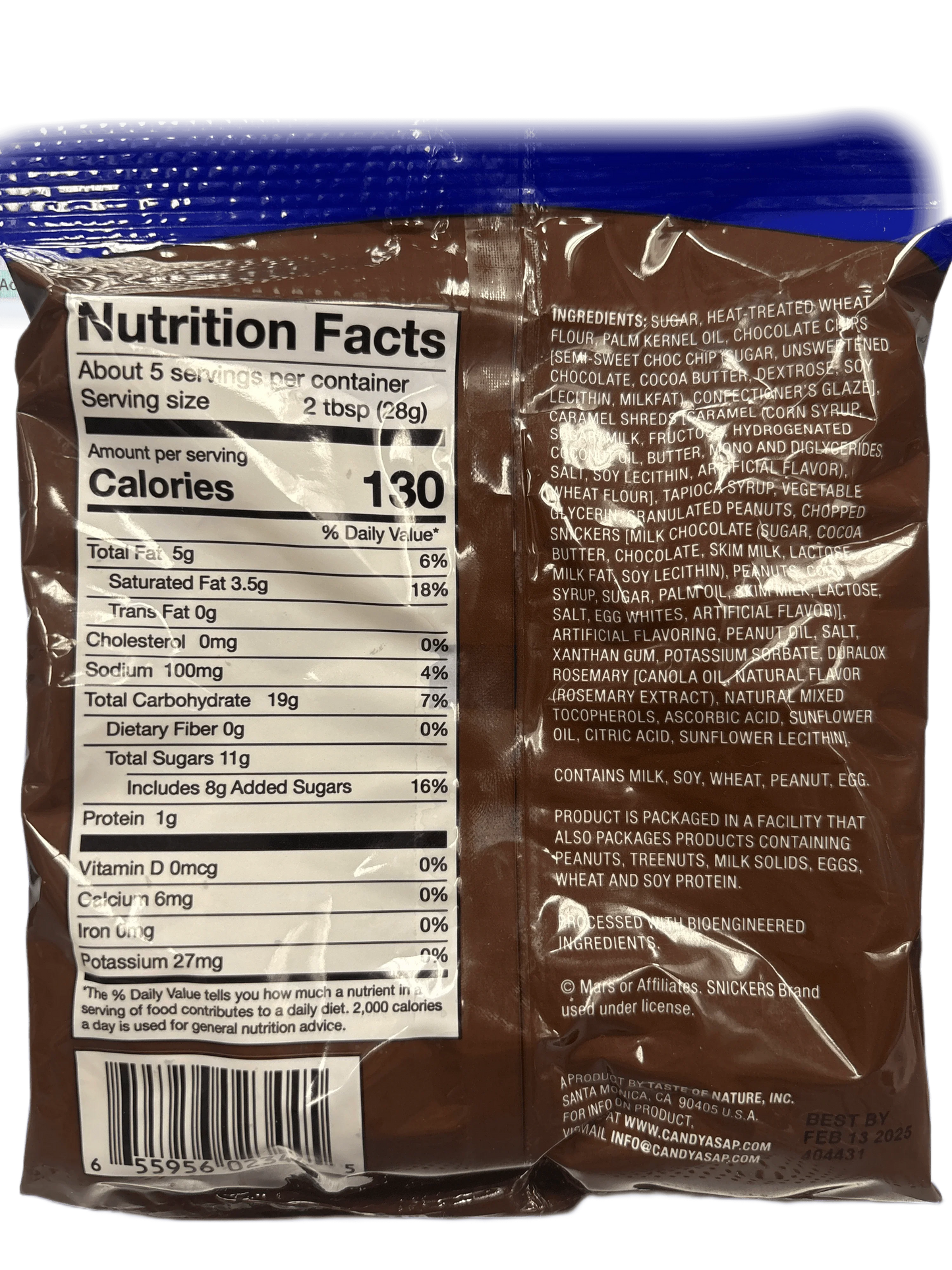 Close-up of chocolate snack packaging with nutrition facts and ingredient list visible.