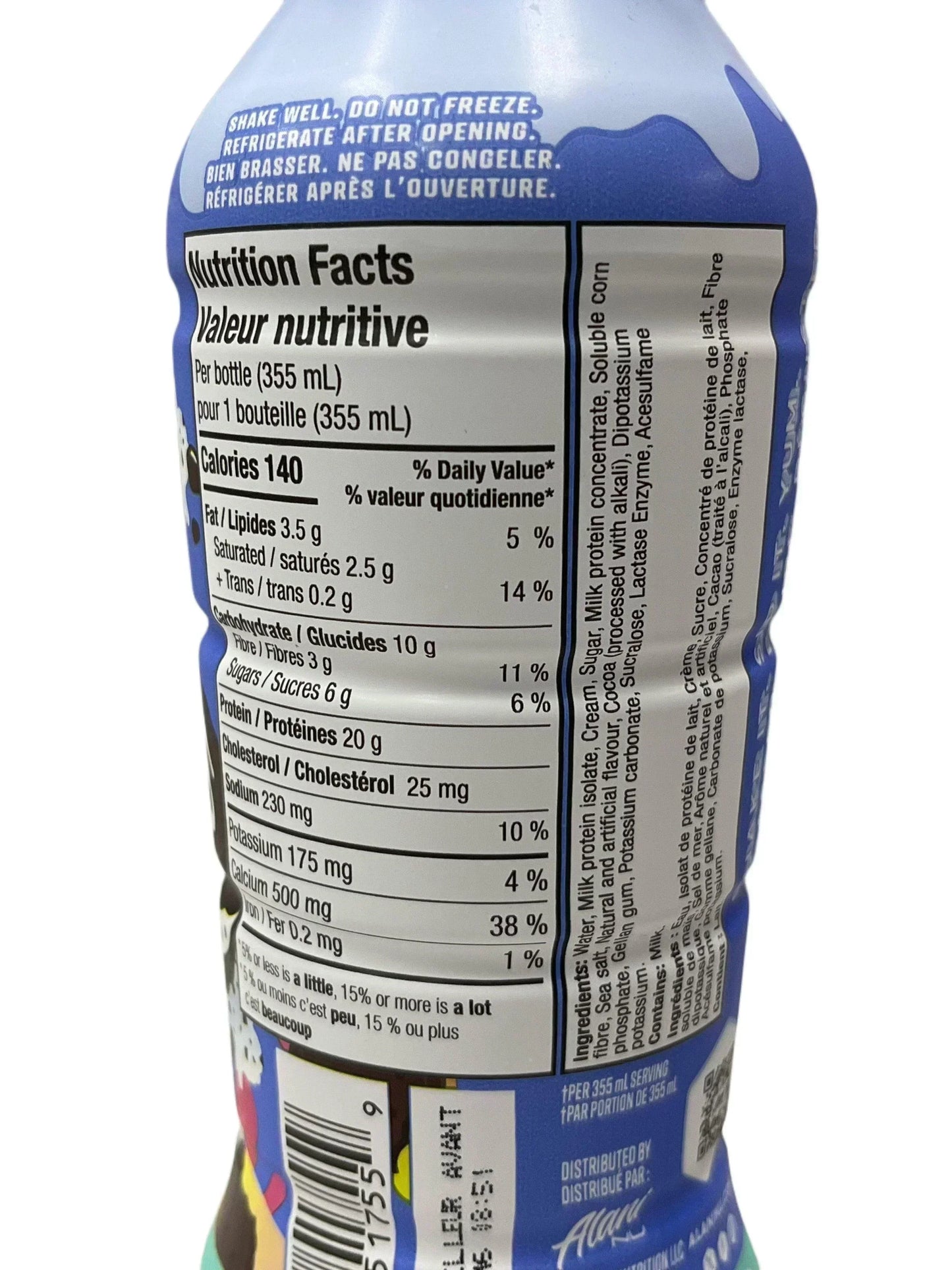 Close-up of nutrition facts and ingredients on bottled exotic snack drink, 355mL serving.