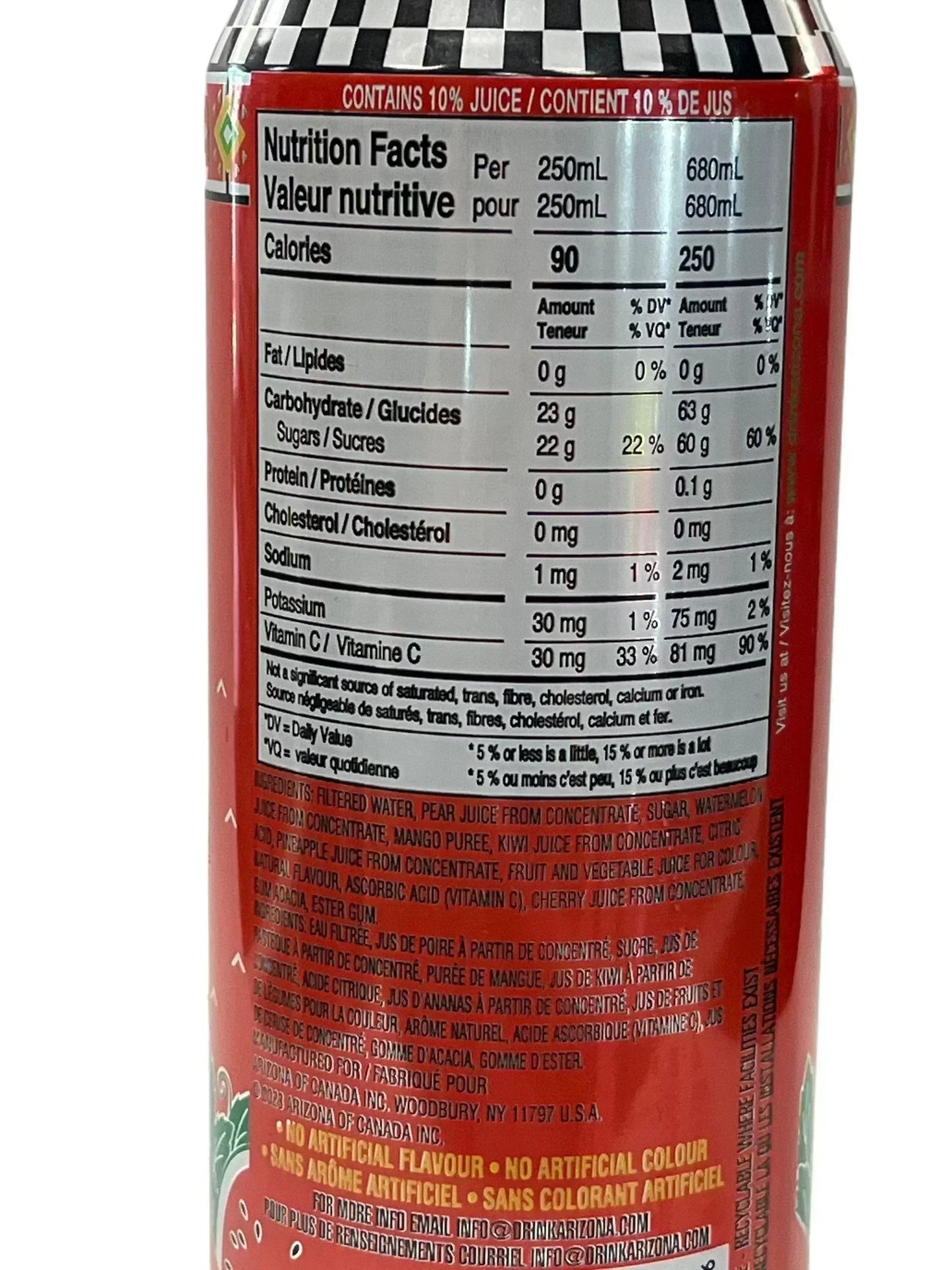 Close-up of exotic fruit juice can nutrition label with ingredients and vitamin C content