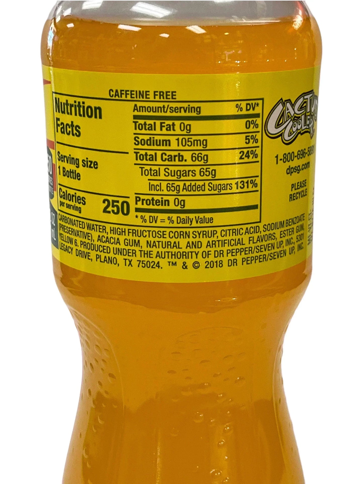 Close-up of yellow exotic soda bottle nutrition facts label, imported global snack drink
