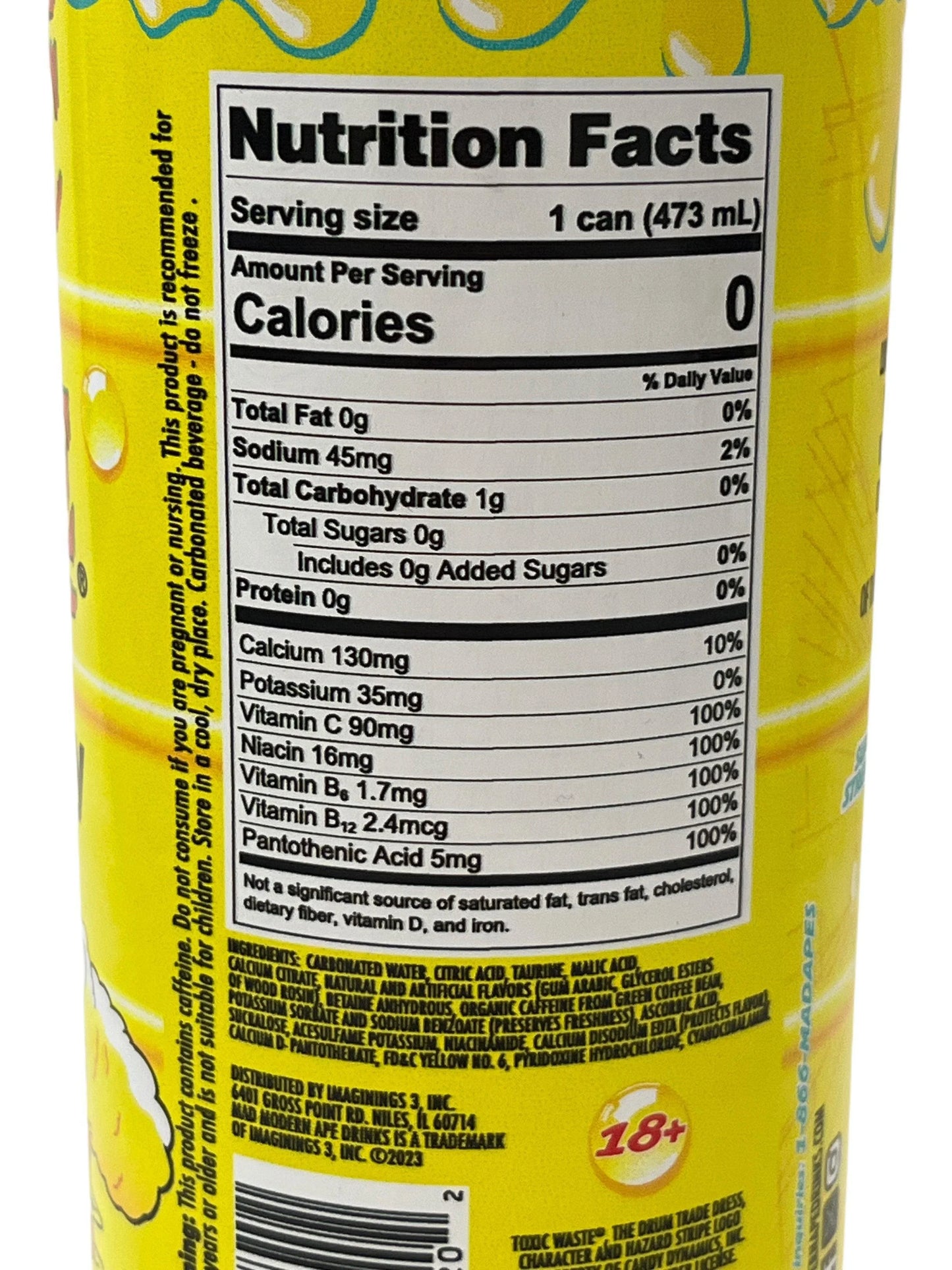 Nutrition facts label on a yellow exotic drink can, showing zero calories and added vitamins.