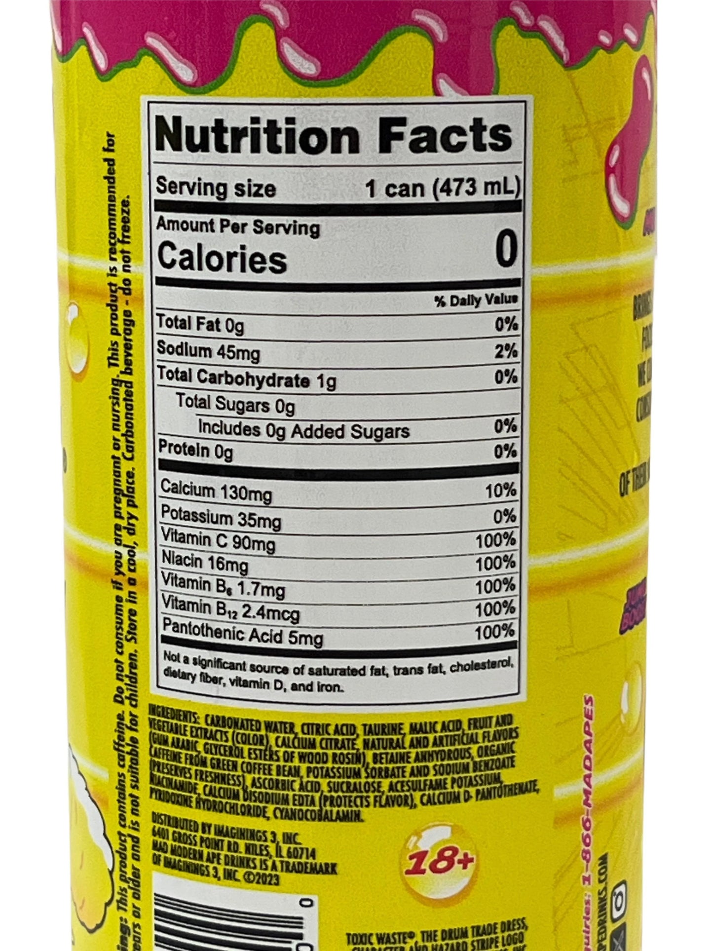 Close-up of nutrition facts on a colorful canned exotic drink with yellow and pink label