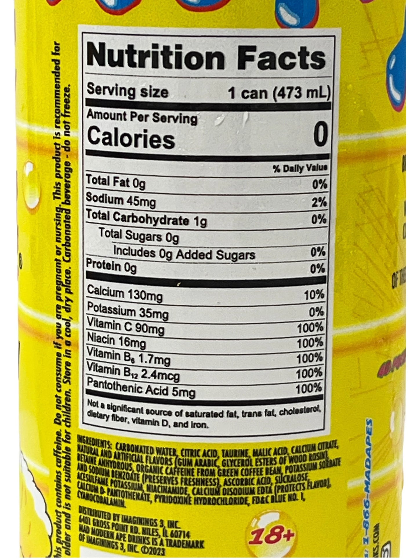 Close-up of exotic canned beverage nutrition facts label, yellow background, imported drink