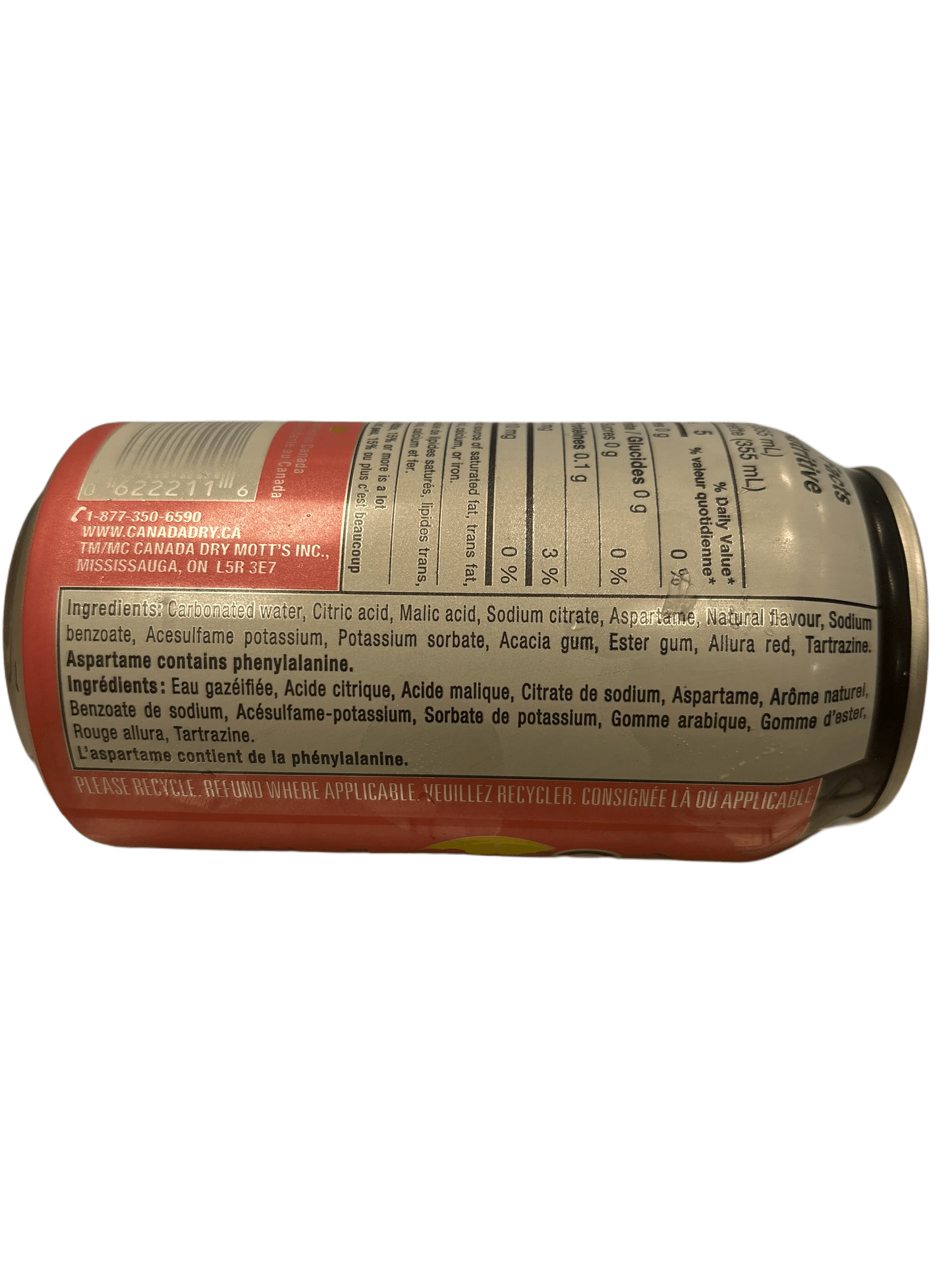Close-up of soda can ingredients and nutrition label, emphasizing details for exotic imported drink.