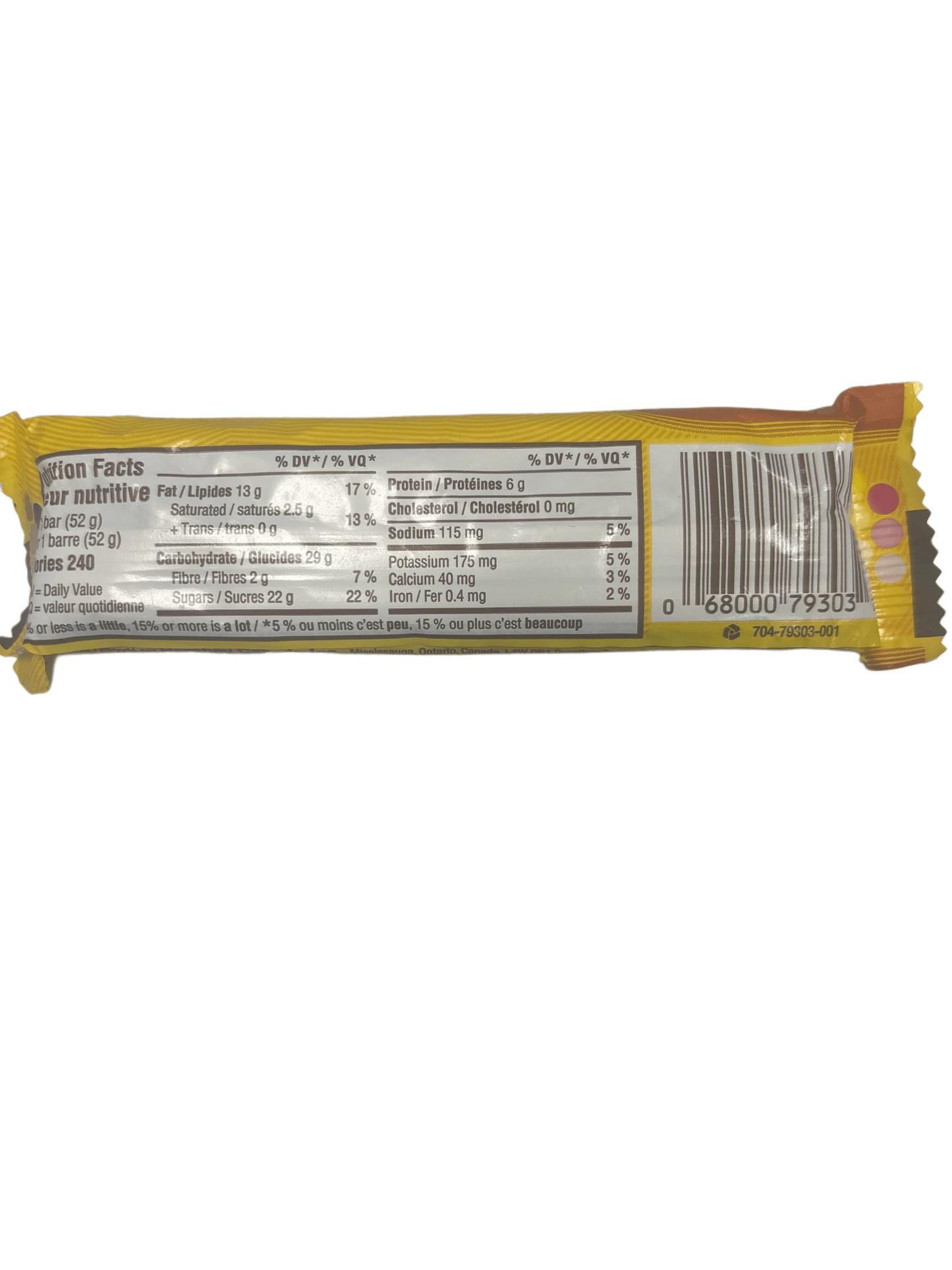 Back of a yellow snack bar showing nutrition facts and barcode, exotic snacks category.