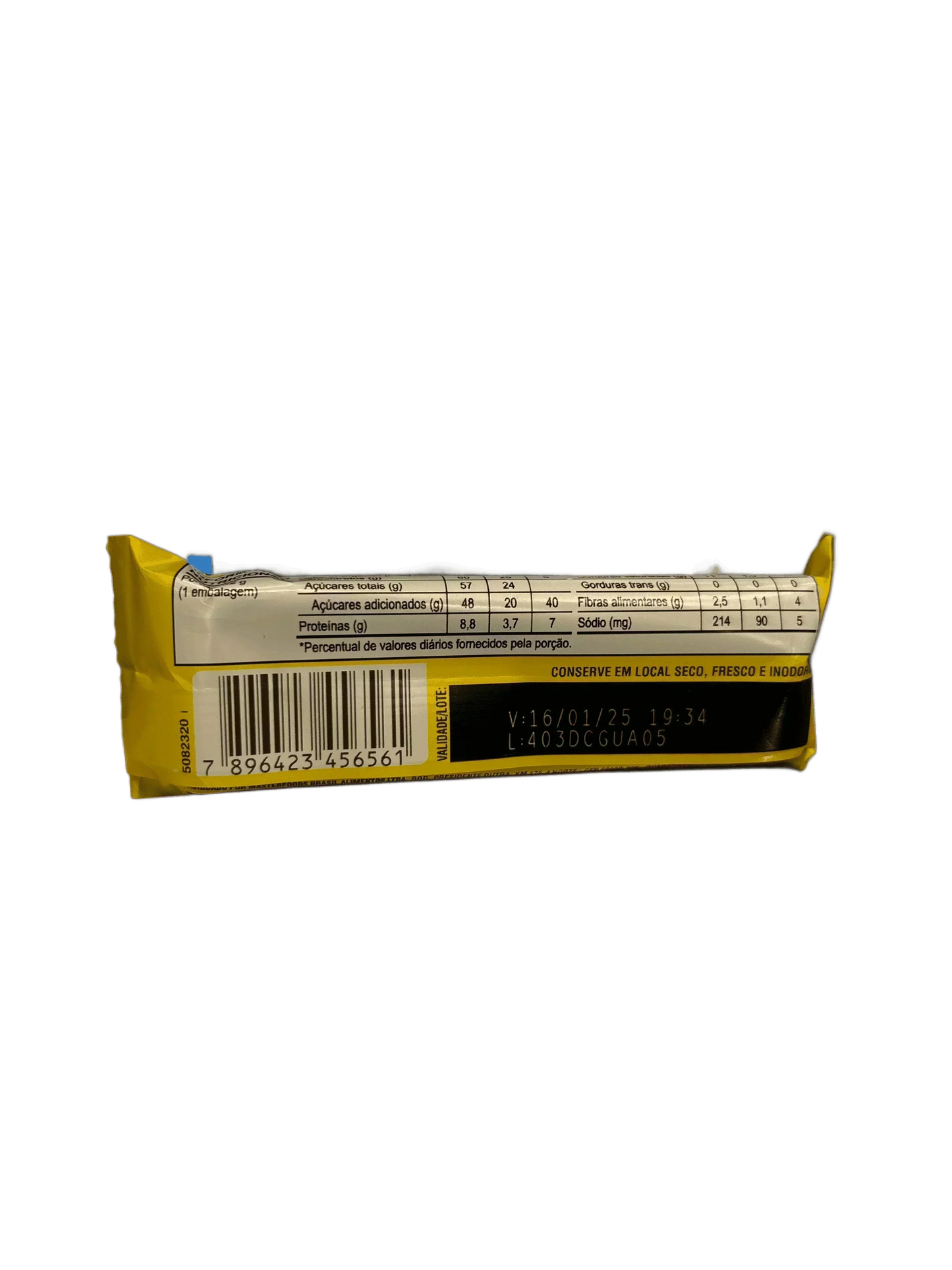 Back of exotic snack bar with nutrition facts, barcode, and yellow packaging
