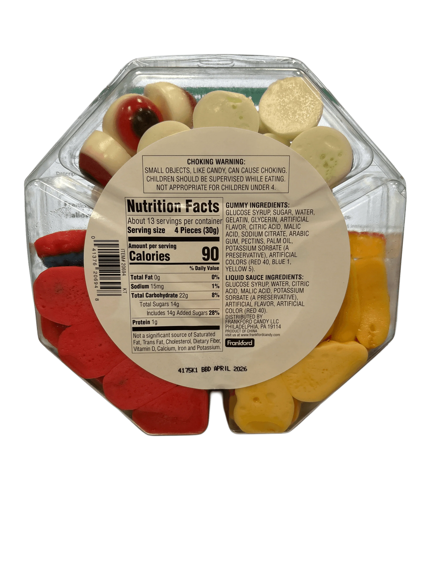 Assorted colorful gummy candy mix in clear plastic container with nutrition label