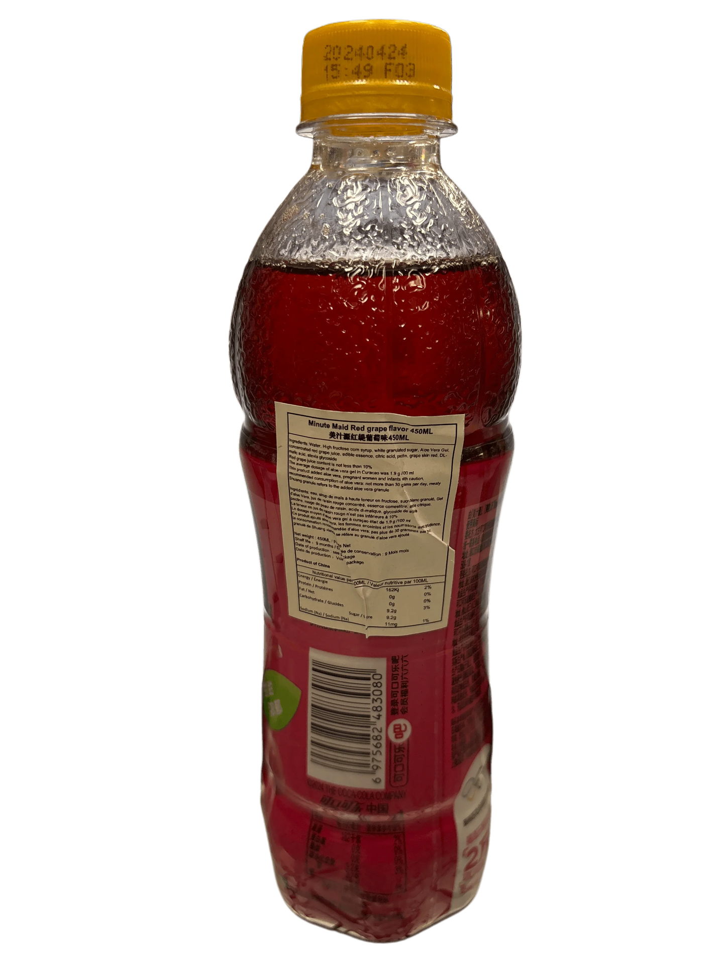 Minute Maid red grape flavored drink in a clear plastic bottle with yellow cap, exotic beverage