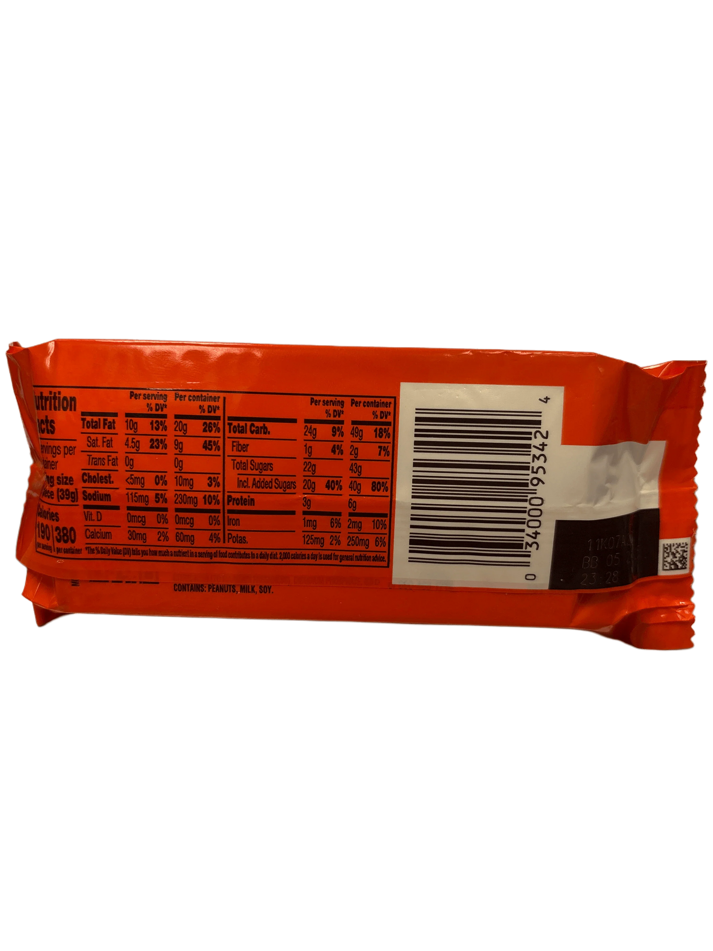 Back of imported snack bar with nutrition facts, ingredients, and barcode on orange packaging
