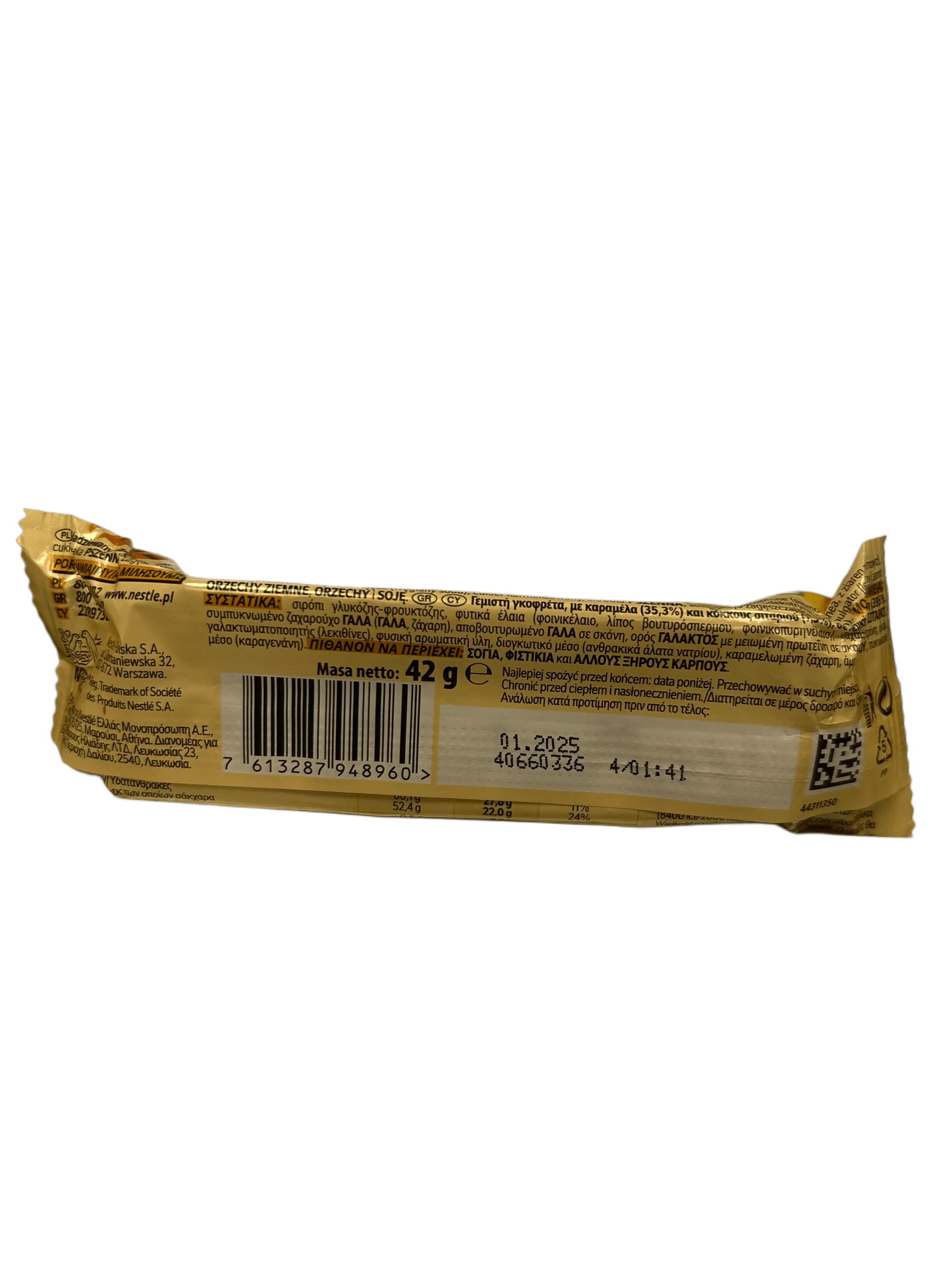 Back of imported candy bar with nutrition label and barcode on gold packaging