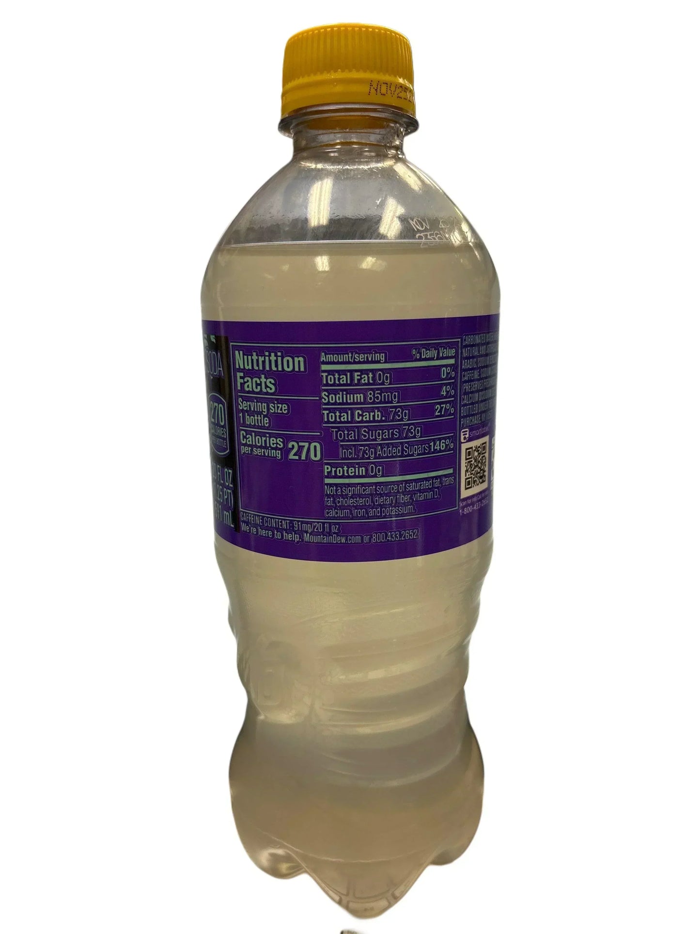 Exotic imported soda in a clear plastic bottle with yellow cap and nutrition label