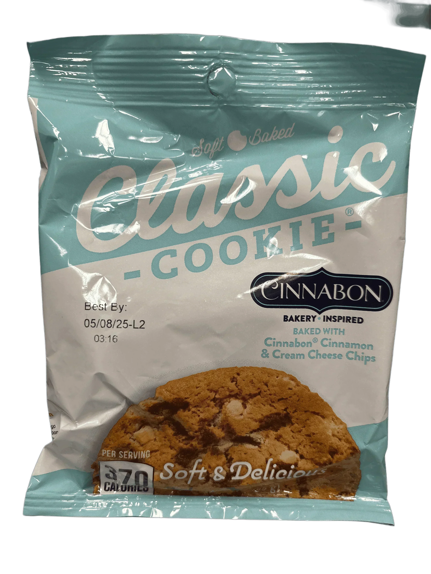 Classic Cookie Cinnabon soft baked cookie with cinnamon and cream cheese chips in blue packaging