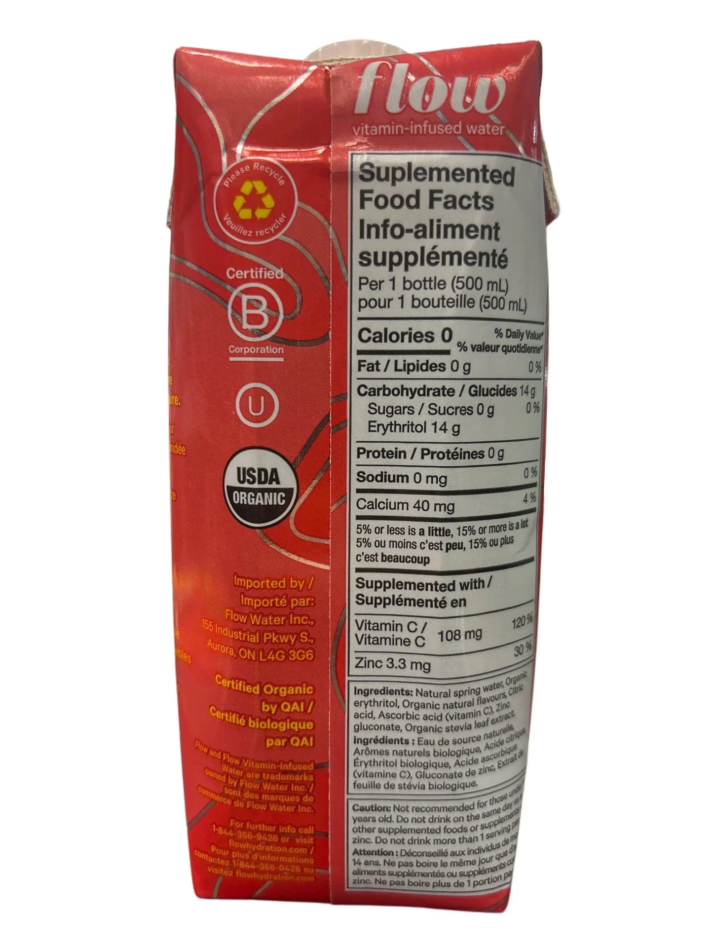Red vitamin-infused water carton with nutritional info, organic and recycle symbols visible