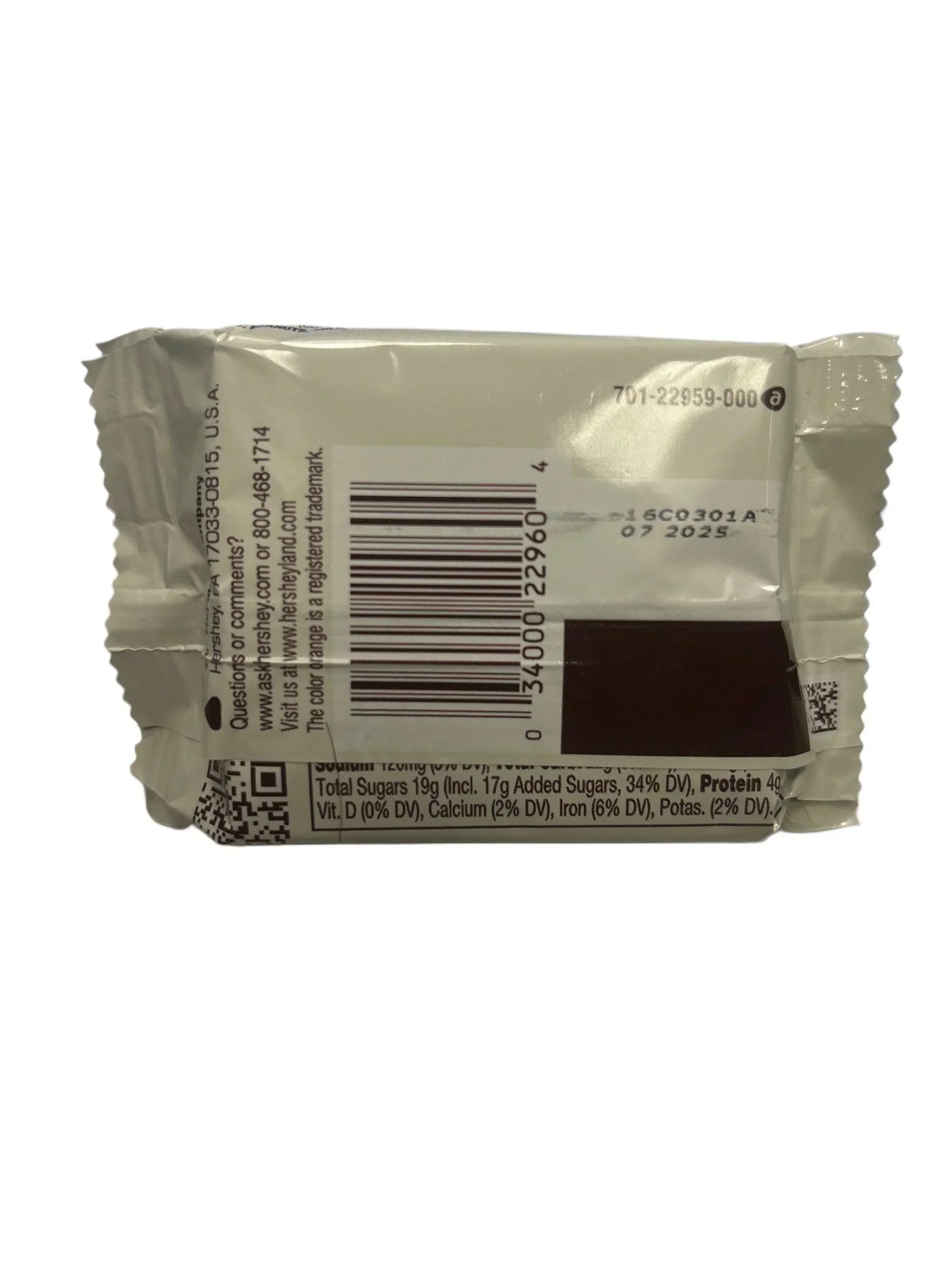 Back of exotic snack bar wrapper with barcode, nutrition facts, and expiration date