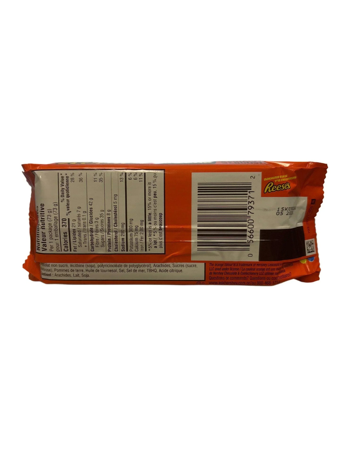 Back of imported Reese's peanut butter chocolate bar with nutrition facts and orange packaging