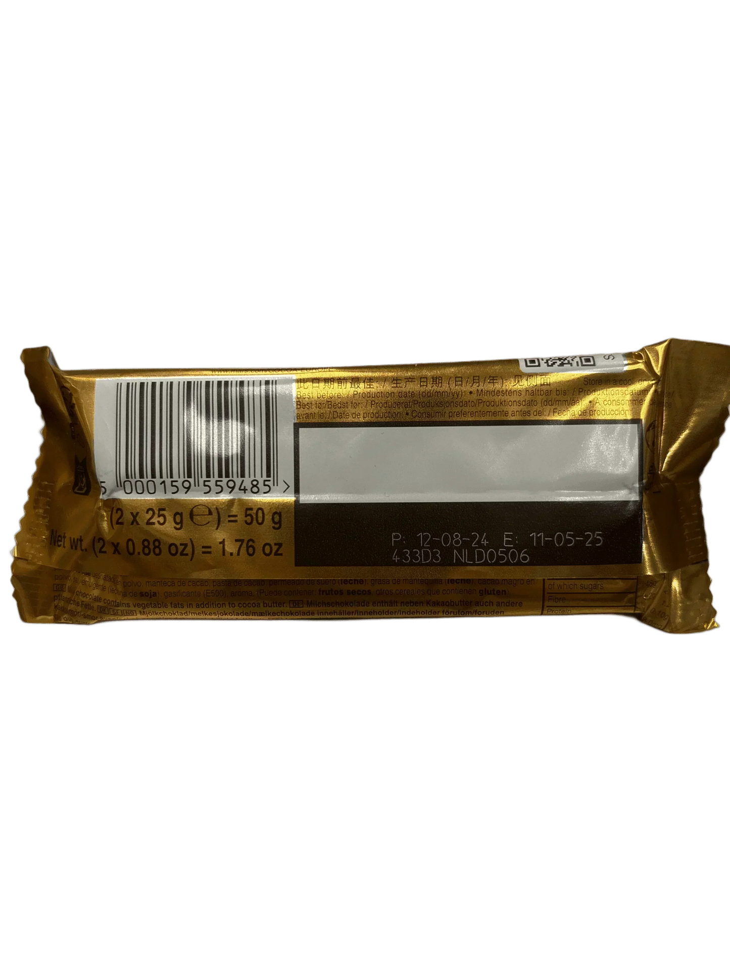 Back of an imported candy bar in gold wrapper showing barcode and nutrition details