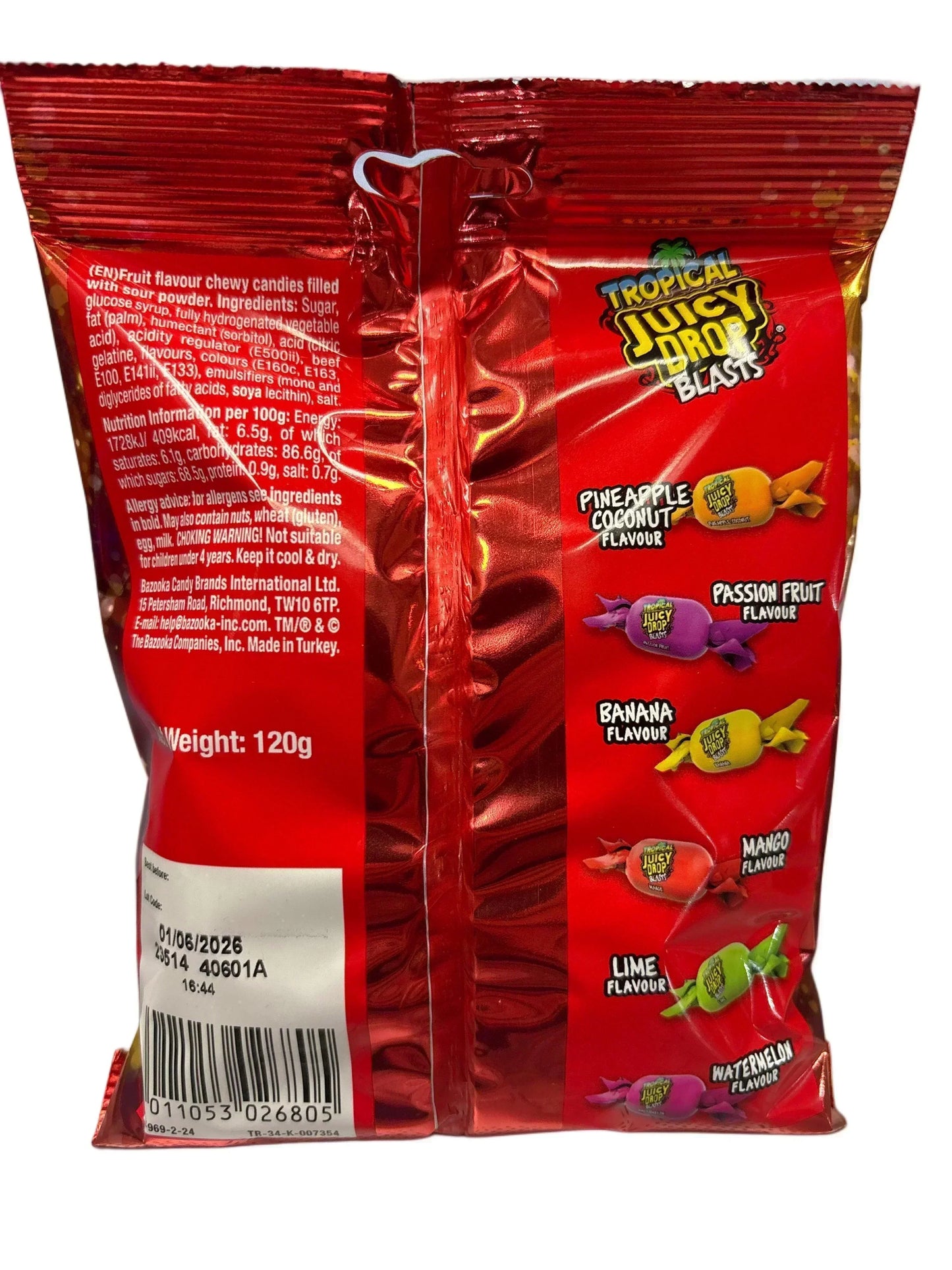 Back of Tropical Juicy Drop Blasts candy bag showing assorted exotic fruit flavors and ingredients.