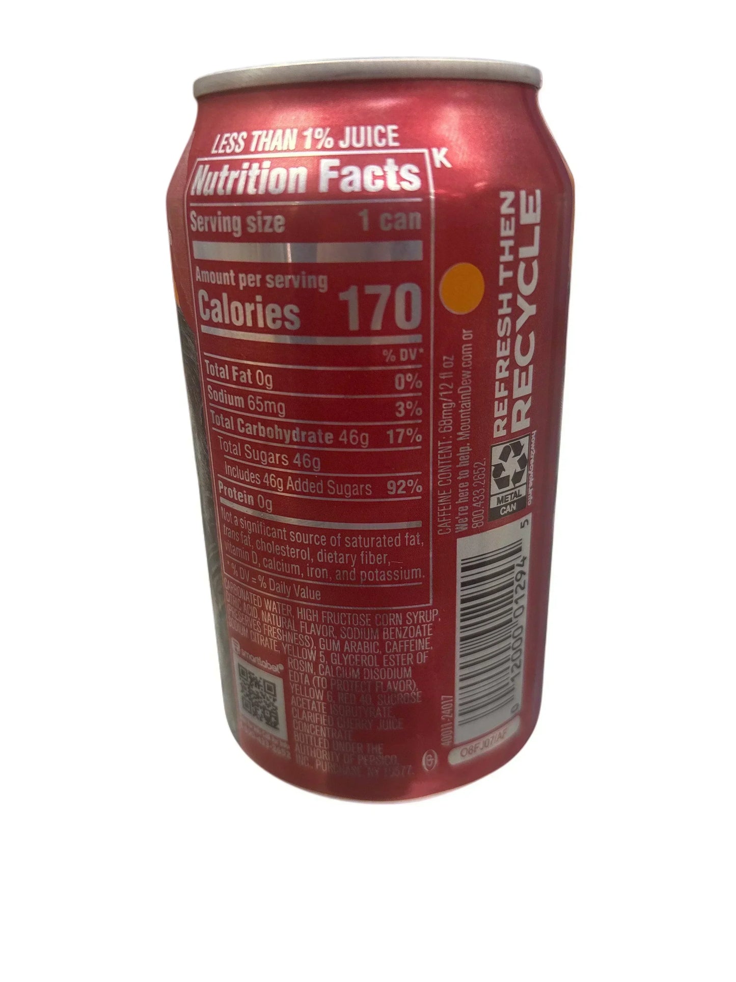 Close-up of red soda can nutrition facts label with calorie and sugar content visible