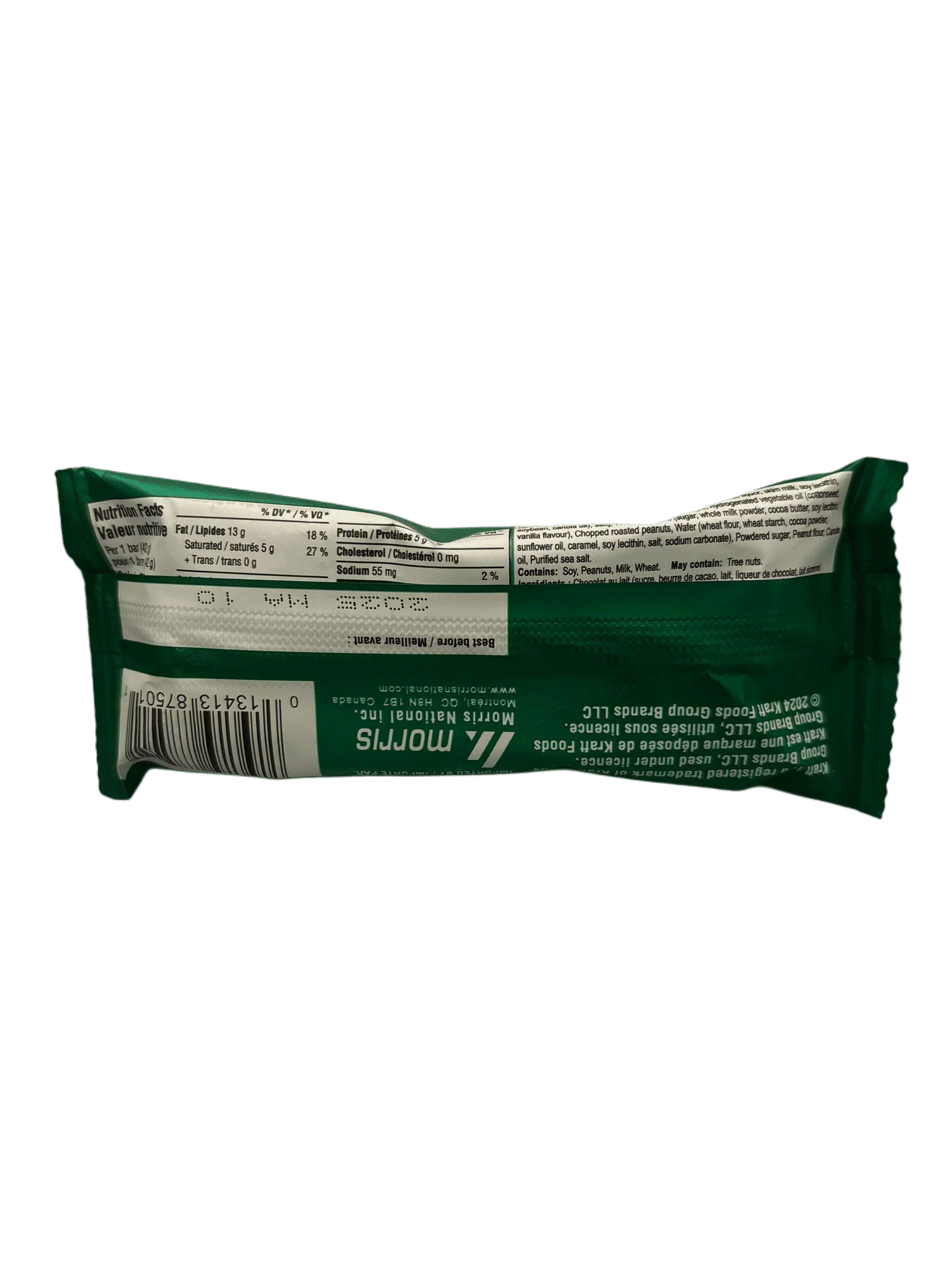 Back of green candy bar wrapper with nutrition facts and barcode visible