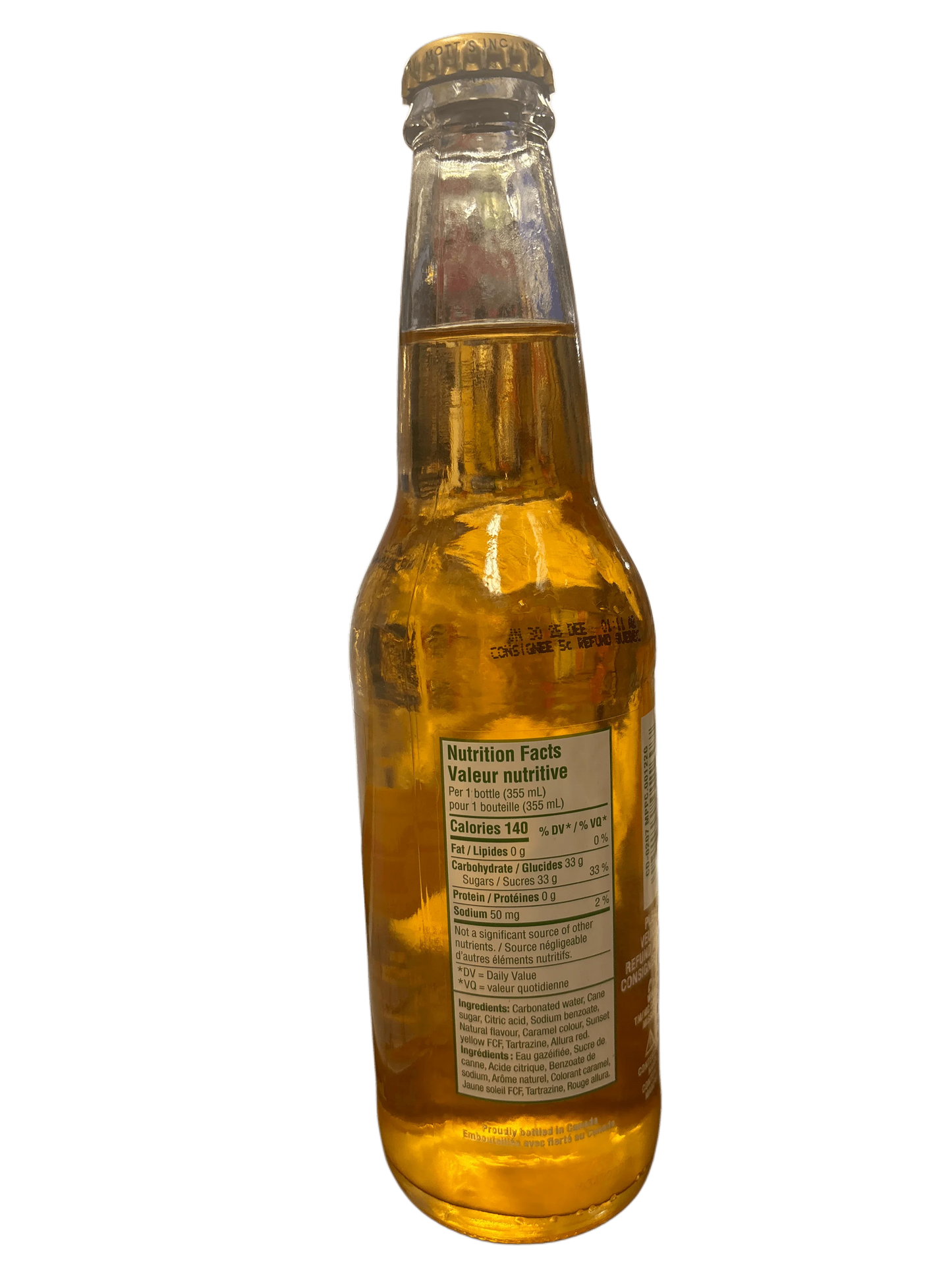 Clear glass bottle of exotic orange soda with visible nutrition label, imported drink