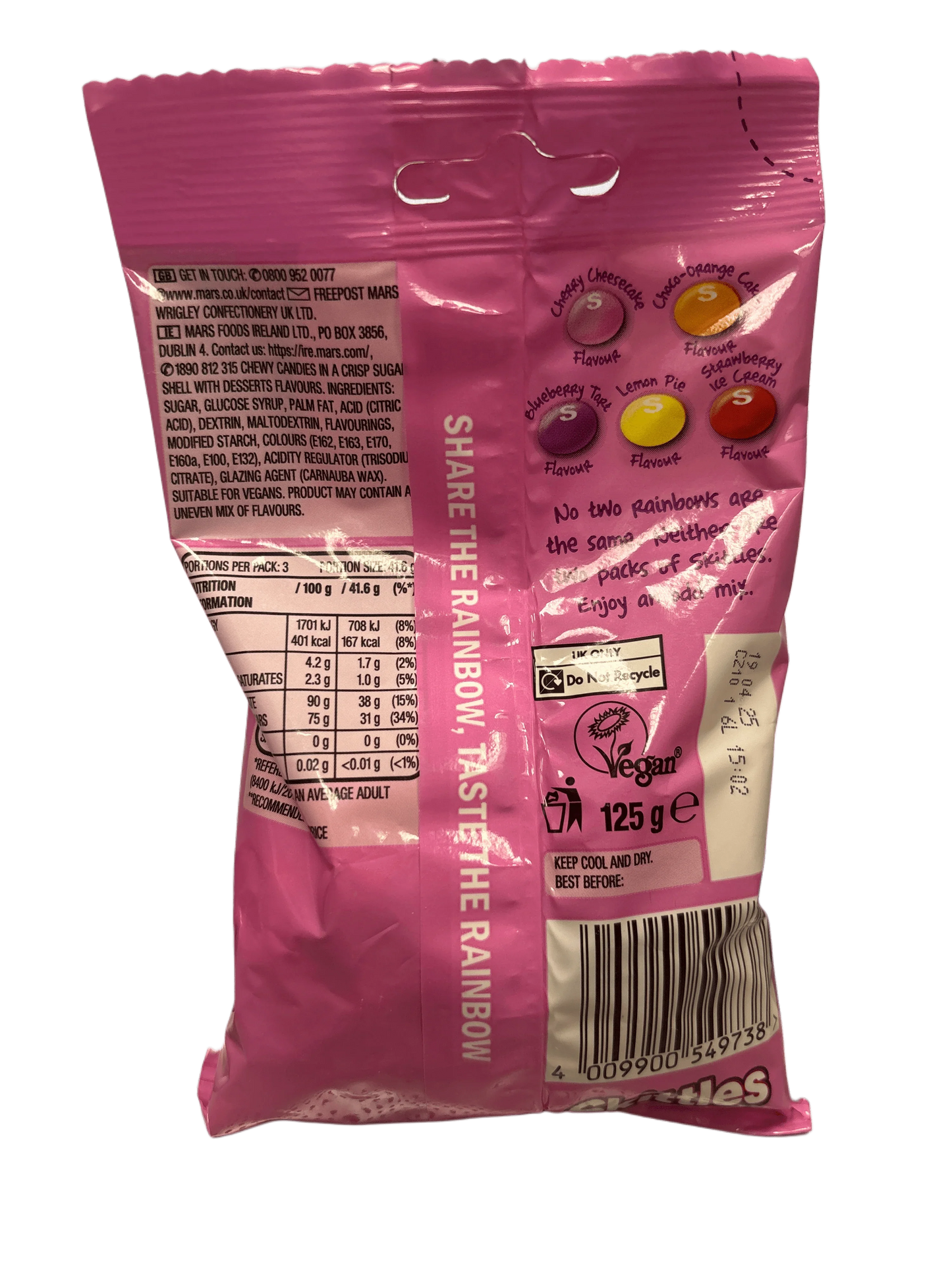 Back of pink Skittles candy bag showing ingredients, nutrition facts, and vegan label