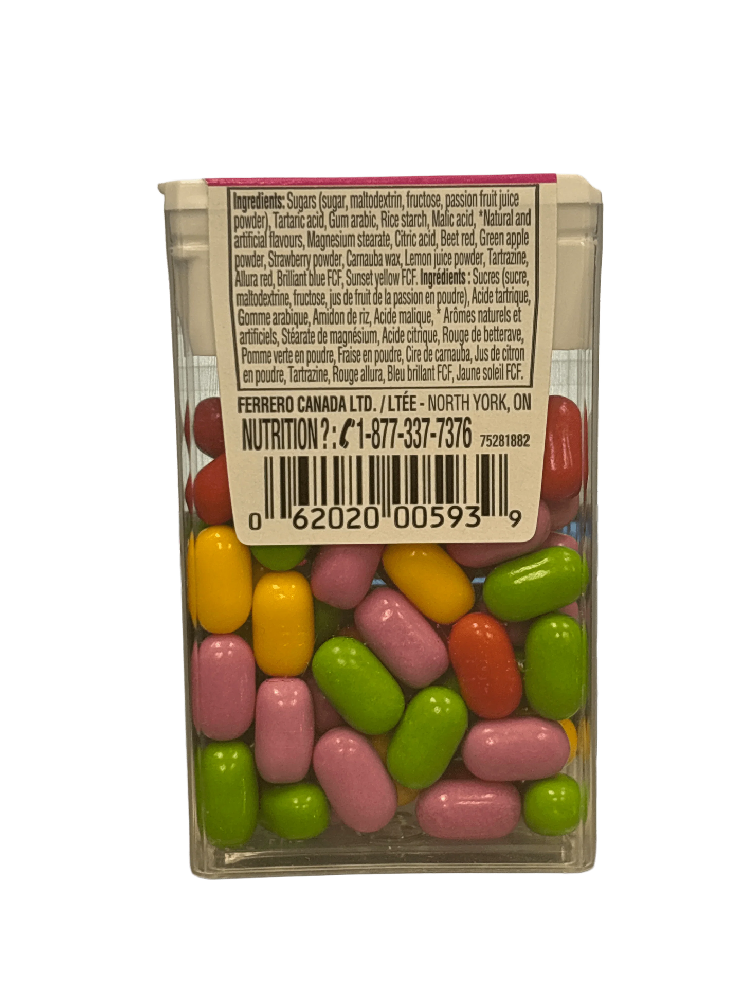 Colorful assorted candy-coated chewy snacks in a clear plastic box with ingredient label visible